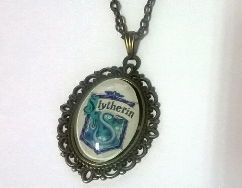 Медальйон Harry Potter Slytherin 4х3 см. -   -  