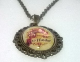 Медальон Harry Potter Gryffindor 4х3 см.