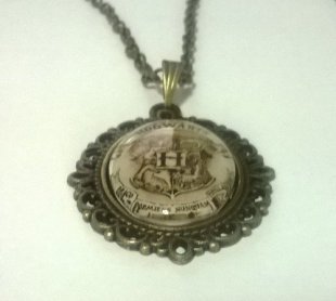 Медальон Harry Potter Hogwarts 4х3 см.