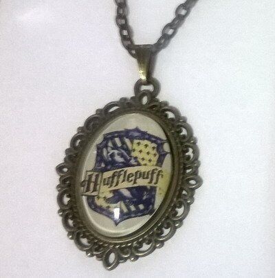 Медальйон Harry Potter Hufflepuff 4х3 см. -   -  
